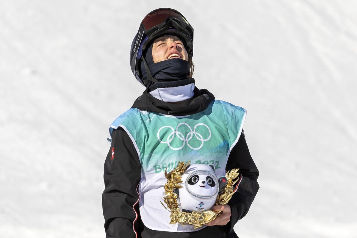 Bronze medalist Mathilde Gremaud of Switzerland reacts on the podium during the flower ceremony after the women's Freestyle Skiing Big Air Final at Big Air Shougang at the 2022 Winter Olympics in ...