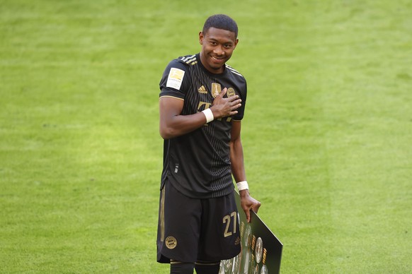 epa09222035 David Alaba of FC Bayern Muenchen reacts prior to the Bundesliga match between FC Bayern Muenchen and FC Augsburg at Allianz Arena in Munich, Germany, 22 May 2021 (issued 23 May 2021). EPA ...