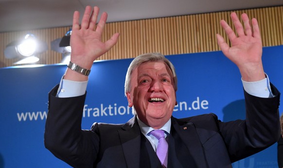 epa07127380 Prime Minister of Hesse, Volker Bouffier of the Christian Democratic Union (CDU) party, waves to his supporters during the Hesse state elections in Wiesbaden, Germany, 28 October 2018. Acc ...