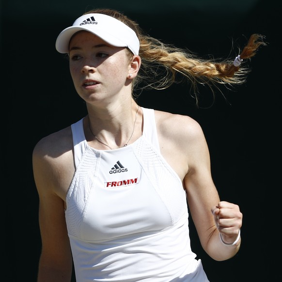 Simona Waltert of Switzerland celebrates after winning her first round girls&#039; singles match against Yuki Naito of Japan at the Wimbledon Championships at the All England Lawn Tennis Club, in Lond ...