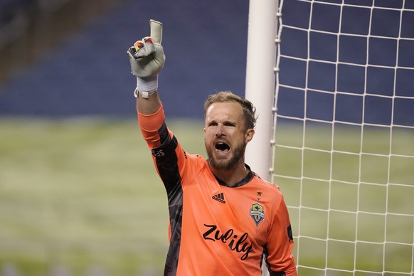Seattle Sounders goalkeeper Stefan Frei lets out a yell after the team&#039;s 3-1 win over Los Angeles FC in an MLS playoff soccer match Tuesday, Nov. 24, 2020, in Seattle. (AP Photo/Ted S. Warren)
St ...