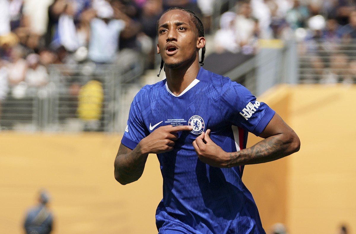 Chelsea's Joao Pedro reacts after scoring a goal against Paris Saint-Germain during the first half of the Club World Cup final soccer match in East Rutherford, N.J., Sunday, July 13, 2025. (AP Ph ...