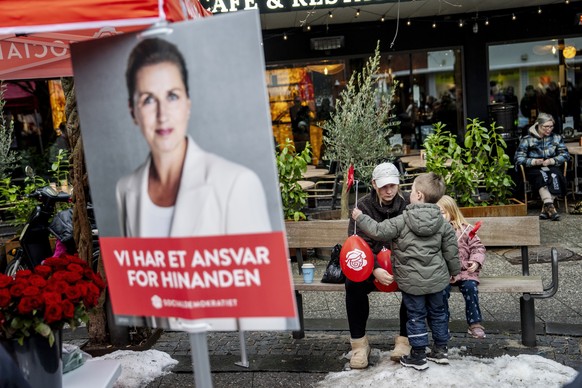 epa12778717 An election campaign poster showing Danish Prime Minister Mette Frederiksen at Herlev Square, in Herlev, a suburb of Copenhagen, Denmark, 26 February 2026. Danish Prime Minister Frederikse ...