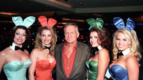 epa06231934 A handout photo made available by the Las Vegas News Bureau on 28 September 2017 shows Hugh Hefner (C) poses with Playboy bunnies at the Hard Rock Hotel in Las Vegas, Nevada, USA, 01 March ...