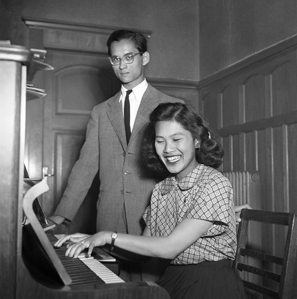 The future wife of Thai king Bhumibol Adulyadej, Sirikit Kitigakara playing piano in September 1949 in Lausanne. Bhumibol studied from 1946 to 1951 in Lausanne, Switzerland politics and law. (KEYSTONE ...