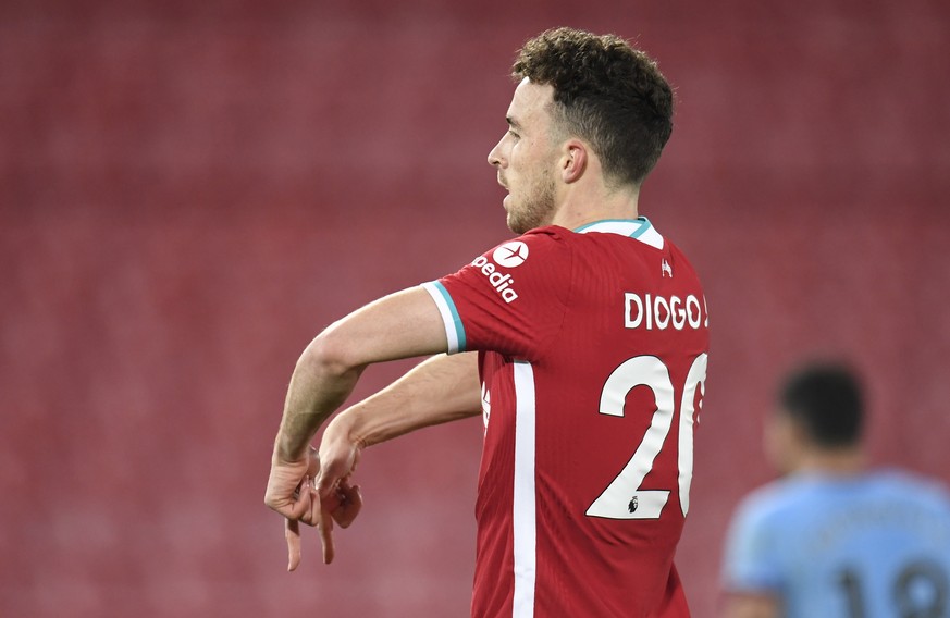 epa08789684 Liverpool&#039;s Diogo Jota celebrates after scoring the 2-1 goal during the English Premier League soccer match between Liverpool FC and West Ham United in Liverpool, Britain, 31 October  ...