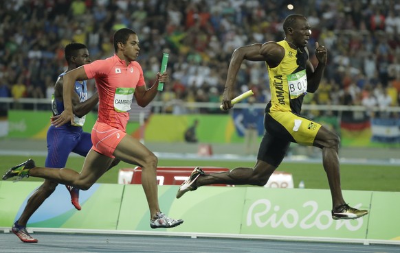 Jamaica&#039;s Usain Bolt, right, competes in the men&#039;s 4x100-meter relay final during the athletics competitions of the 2016 Summer Olympics at the Olympic stadium in Rio de Janeiro, Brazil, Fri ...