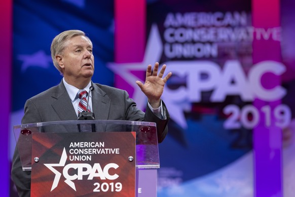 epa07405028 Republican Senator of South Carolina Lindsey Graham speaks at the 46th annual Conservative Political Action Conference (CPAC) at the Gaylord National Resort &amp; Convention Center in Nati ...