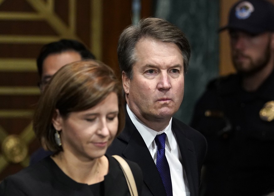 epa07052279 Judge Brett Kavanaugh arrives to testify with his wife Ashley Estes Kavanaugh before the Senate Judiciary Committee hearing on the nomination of Brett Kavanaugh to be an associate justice  ...