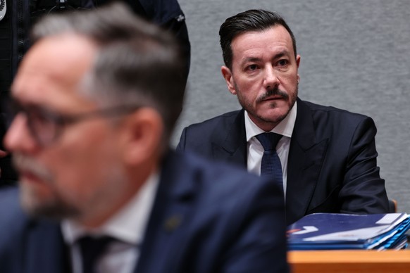 epaselect epa12454797 Rene Benko (R) is seen with his lawyer, Hon.-Prof. Dr. Norbert Wess (L), before the main hearing in the criminal case against Benko for fraudulent bankruptcy at the Innsbruck Reg ...