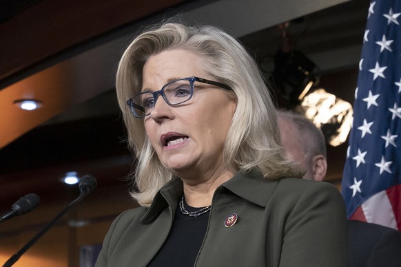 FILE - In this Dec. 17, 2019 file photo, Rep. Liz Cheney, R-Wyo., speaks with reporters at the Capitol in Washington. A deepening divide among Republicans over President Donald Trump's efforts to over ...