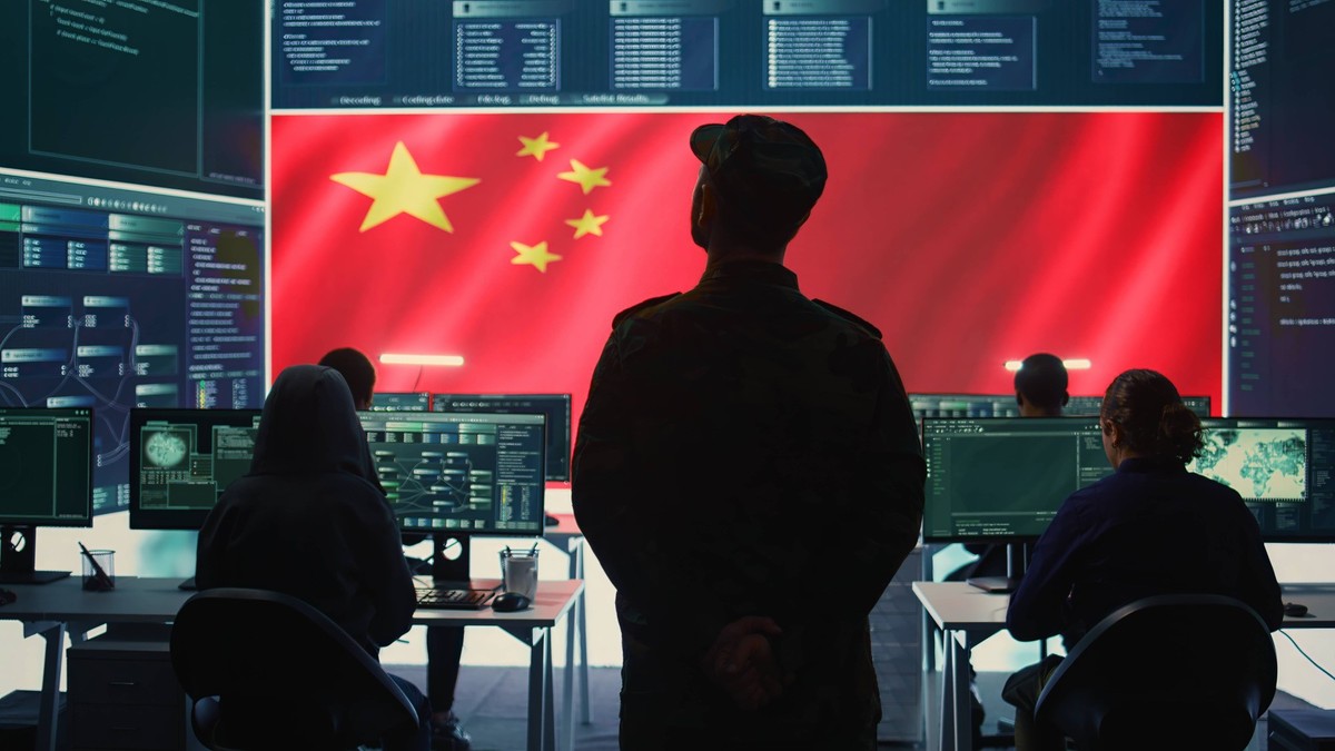 Chinese military personnel in a high tech government hacking room Chinese military personnel in a high tech government hacking room work on stealing state secrets from rival countries in hybrid war.