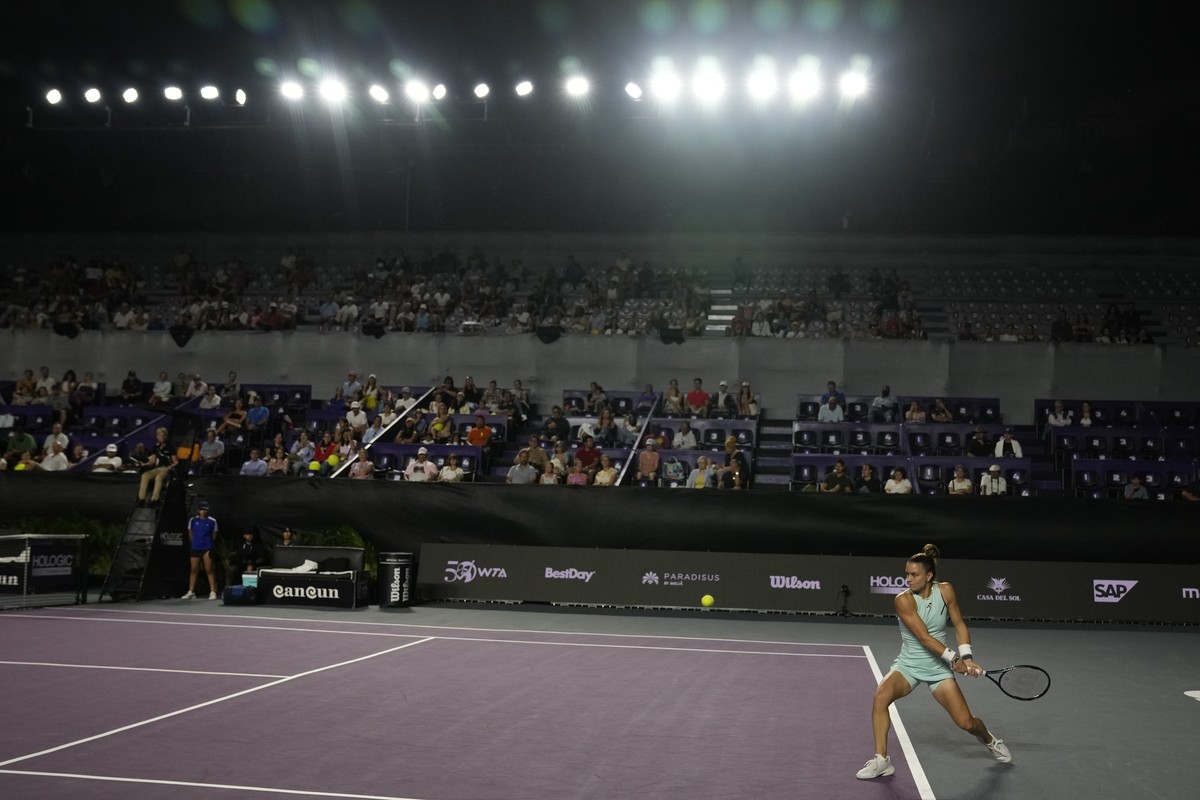Maria Sakkari of Greece returns a shot to Jessica Pegula of the United States, during a women's singles match at the WTA Finals tennis championships, in Cancun, Mexico, Thursday, Nov. 2, 2023. (A ...