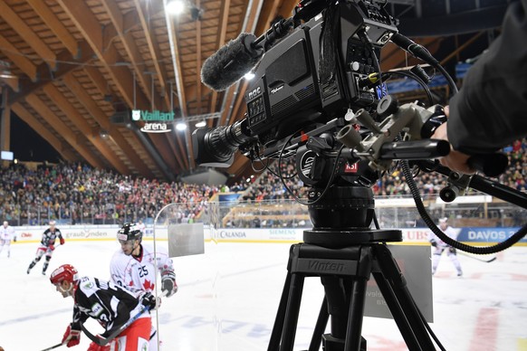 A camera of Swiss TV broadcaster RSI SRG captures the game the game between Team Canada and Mountfield HK at the 91th Spengler Cup ice hockey tournament in Davos, Switzerland, Tuesday, December 26, 20 ...