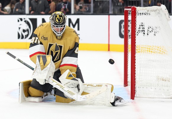 Vegas Golden Knights goaltender Akira Schmid (40) stops a shot against the Boston Bruins during the third period of an NHL hockey game Thursday, Oct. 16, 2025, in Las Vegas. (AP Photo/Ian Maule)
Bruin ...