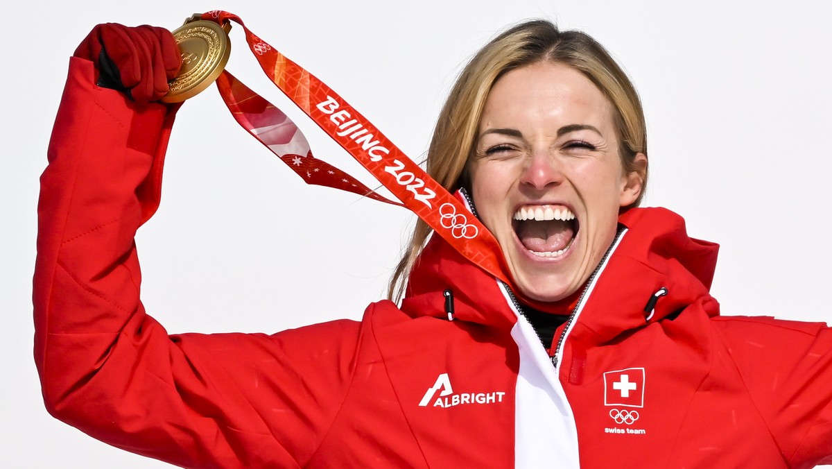 epa09745756 Gold medalist Lara Gut-Behrami of Switzerland celebrates during the victory ceremony of the Women's Super-G race of the Alpine Skiing events of the Beijing 2022 Olympic Games at the Y ...