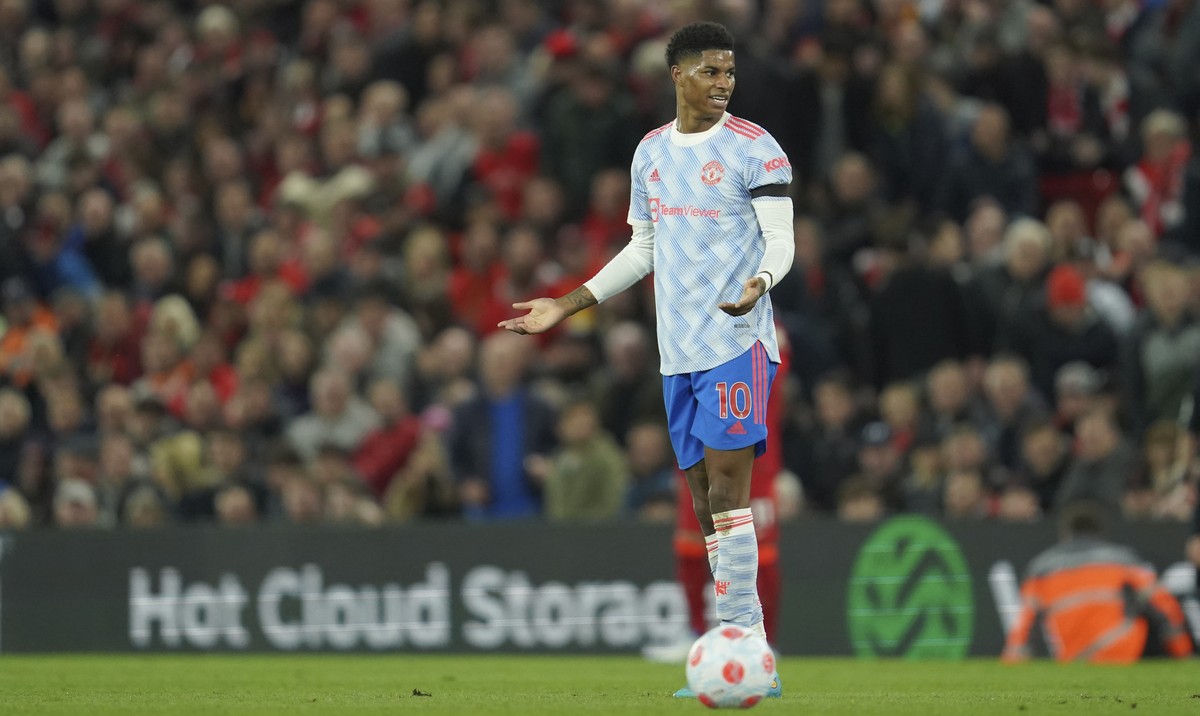 Manchester United's Marcus Rashford gestures during the English Premier League soccer match between Liverpool and Manchester United at Anfield stadium in Liverpool, England, Tuesday, April 19, 20 ...