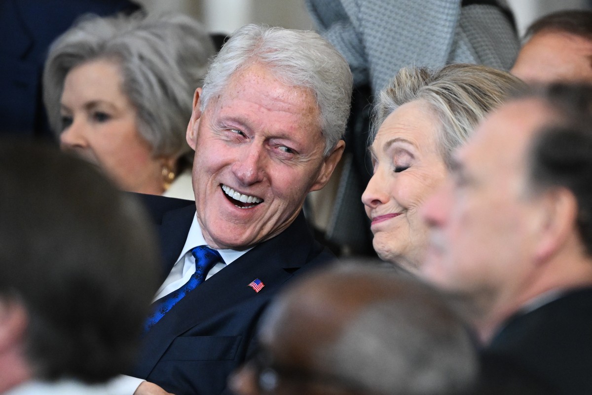 epa11839440 (L-R) Former US President Bill Clinton and former Secretary of State Hillary Clinton listen as President Donald Trump speaks after being sworn in as the 47th President in the US Capitol Ro ...
