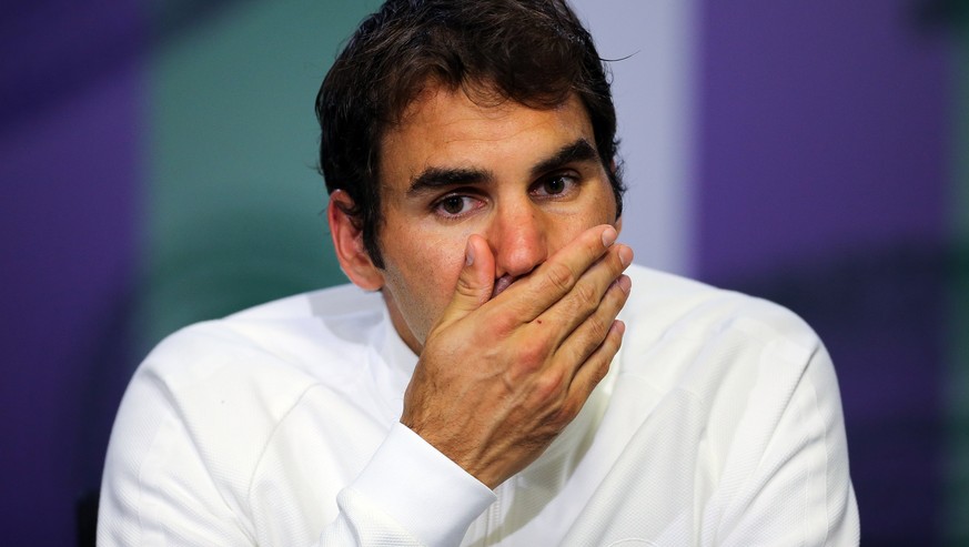 FILE - In this July 8, 2016, file photo, Roger Federer of Switzerland gives a press conference after being beaten in his men&#039;s semifinal singles match against Milos Raonic of Canada, at the Wimbl ...