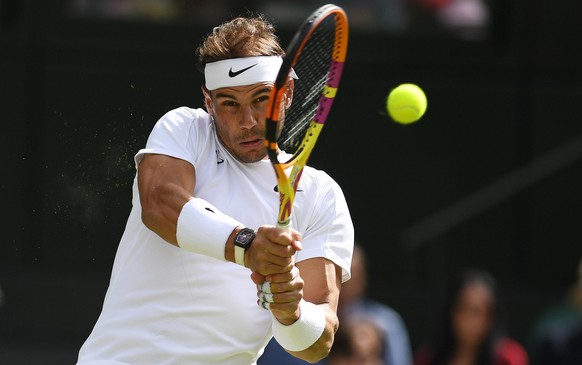 epa10043900 Rafael Nadal of Spain in action in the men&#039;s second round match against Ricardas Berankis of Lithuania at the Wimbledon Championships, in Wimbledon, Britain, 30 June 2022. EPA/NEIL HA ...