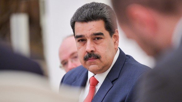 epa07868012 Venezuelan President Nicolas Maduro (C) attends a meeting with Russian President Vladimir Putin (not pictured) in the Kremlin in Moscow, Russia, 25 September 2019. Venezuelan President Nic ...