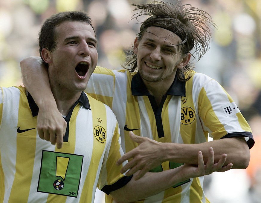 Dortmund&#039;s Alexander Frei, left, of Switzerland and Ebi Smolarek of Poland celebrate after scoring during German first division soccer match between Borussia Dortmund and Schalke 04 at the Signal ...