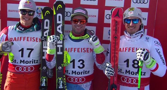 Das Podest der WM- Abfahrt: Beat Feuz mit Erik Guay (links) und Max Franz (rechts).