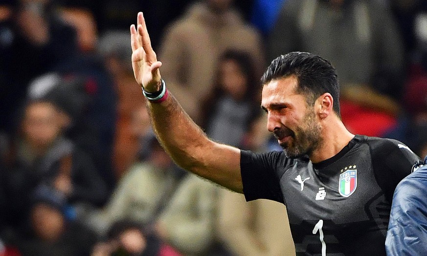 epa06327512 Italy&#039;s goalkeeper Gianluigi Buffon reacts after the FIFA World Cup 2018 qualification playoff, second leg soccer match between Italy and Sweden at the Giuseppe Meazza stadium in Mila ...