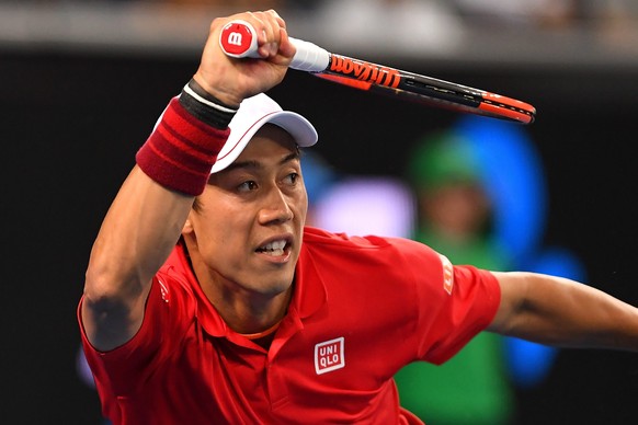 epa05733605 Kei Nishikori of Japan in action against Lukas Lacko of Slovakia during their Men&#039;s Singles third round match for the Australian Open tennis tournament, in Melbourne, Australia, 20 Ja ...