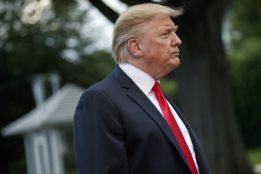 epa07588012 US President Donald J. Trump responds to a question from the news media as he walks to board Marine One on the South Lawn of the White House in Washington, DC, USA, 20 May 2019. President  ...