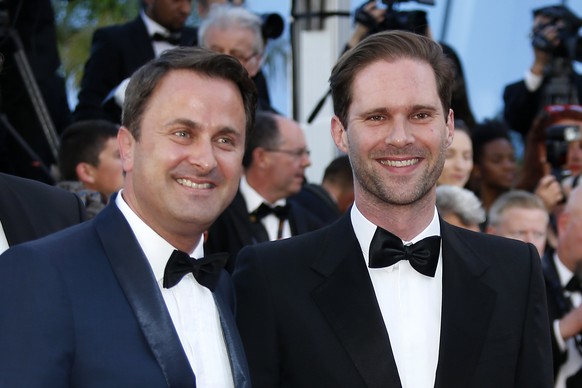 epa05970066 Luxembourg&#039;s Prime Minister Xavier Bettel (L) and his husband Gauthier Destenay (R) arrive for the screening of &#039;Les Fantomes d&#039;Ismael&#039; (Ismael&#039;s Ghosts) and the O ...