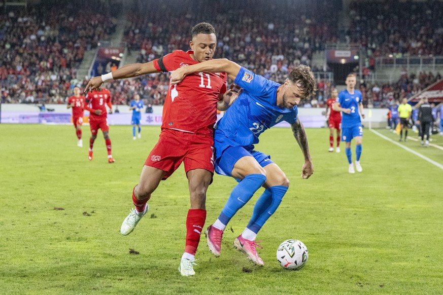 epa13279454 Switzerland's Dan Ndoye and David Brekalo of Czech Republic in action during the UEFA Nations League soccer match between Switzerland and Slovenia, in Lucerne, Switzerland, 03 October ...