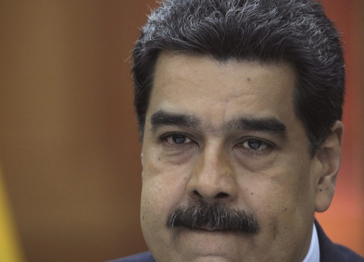 FILE - In this Jan. 9, 2019 file photo, Venezuela's President Nicolas Maduro holds a press conference with foreign media at Miraflores presidential palace in Caracas, Venezuela. A member of Venez ...
