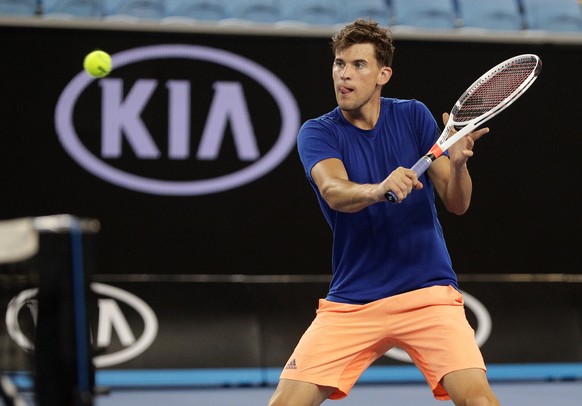 Austria&#039;s Dominic Thiem makes a backhand return to Spain&#039;s Rafael Nadal during a practice match on Margaret Court Arena ahead of the Australian Open tennis championships in Melbourne, Austra ...