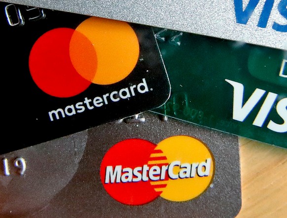 FILE - In this Feb. 20, 2019, file photo are Mastercard and Visa credit cards in Zelienople, Pa. (AP Photo/Keith Srakocic, File)
Visa Mastercard Settlement