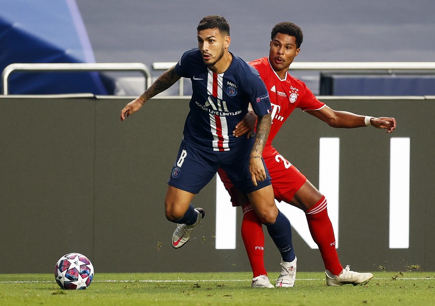 epa08641759 (FILE) Leandro Paredes (L) of PSG in action against Serge Gnabry (R) of Munich during the UEFA Champions League final between Paris Saint-Germain and Bayern Munich in Lisbon, Portugal, 23  ...