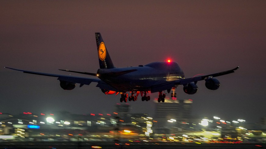FILE --A Lufthansa Boeing 747 aircraft approaches the international airport in Frankfurt, Germany, early Friday, Aug. 13, 2021. A German union has called on Lufthansa ground staff to walk out on a one ...
