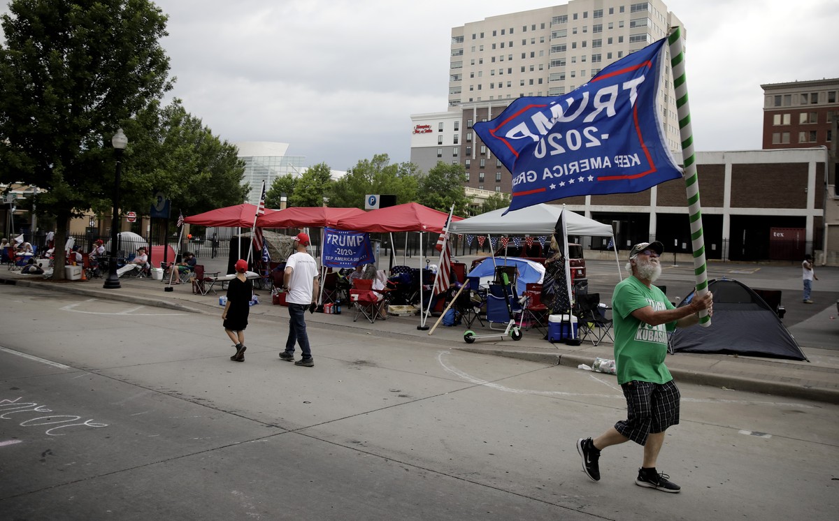 Mike Pellerin joins other Trump supporters on 4th Street and Cheyenne Ave. in downtown Tulsa, Okla., ahead of President Donald Trump's Saturday's campaign rally Friday, June 19, 2020. (Mike  ...