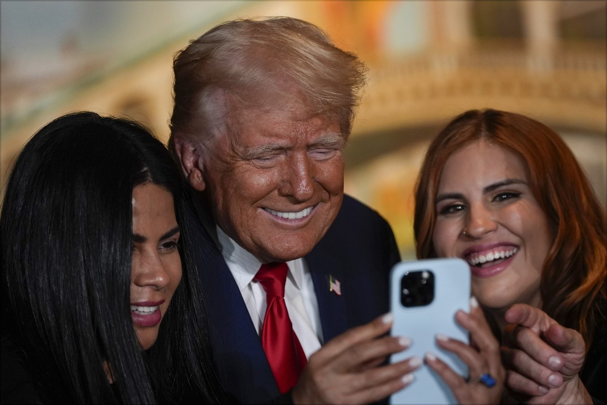 Republican presidential nominee former President Donald Trump poses for a photo at a campaign event at ll Toro E La Capra, Friday, Aug. 23, 2024, in Las Vegas. (AP Photo/Julia Nikhinson)
Donald Trump