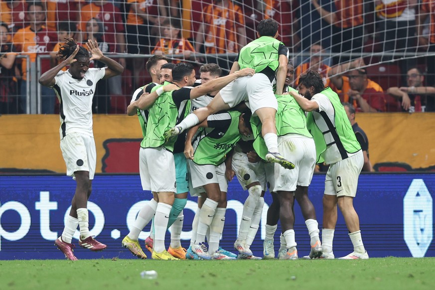 epa11567769 Young Boys&#039; players celebrate after scoring the 0-1 goal during the UEFA Champions League play-off second leg soccer match between Galatasaray Istanbul and BSC Young Boys, in Istanbul ...