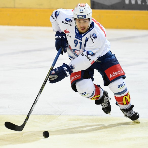 Zurich&#039;s player Inti Pestoni in action during the preliminary round game of National League Swiss Championship 2017/18 between HC Ambri Piotta and ZSC Lions, at the ice stadium Valascia in Ambri, ...