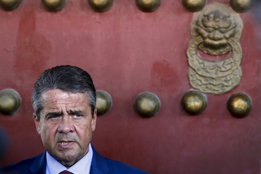 German Foreign Minister Sigmar Gabriel speaks to the journalists after attending the opening ceremony of the &quot;Deutschland 8&quot; Exhibition at Taimiao Temple next to the Forbidden City in Beijin ...