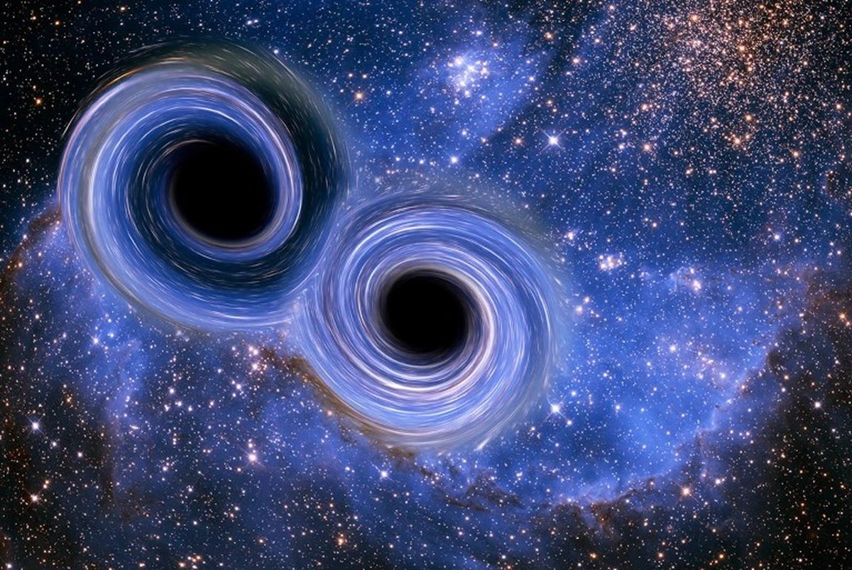 Artist's impression of two black holes merging, which can be detected on Earth through the gravitational waves the collision creates.