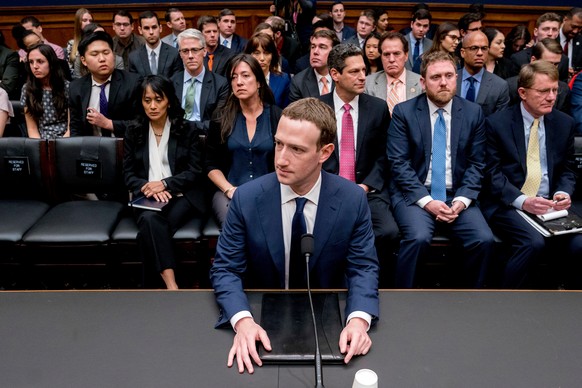 FILE- In this Wednesday, April 11, 2018, file photo, Facebook CEO Mark Zuckerberg arrives to testify before a House Energy and Commerce hearing on Capitol Hill in Washington. Zuckerberg repeatedly ass ...