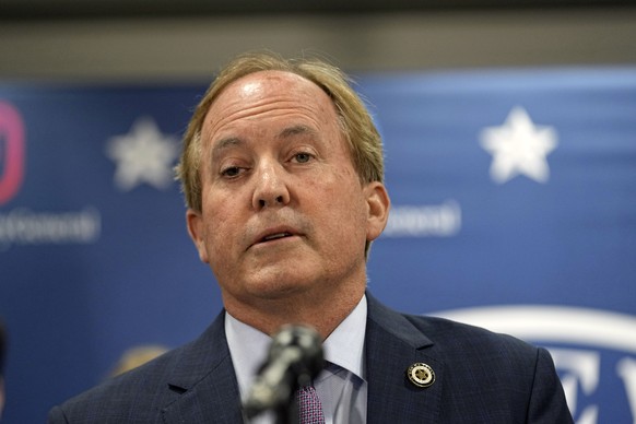 Texas state Attorney General Ken Paxton reads a statement at his office in Austin, Texas, Friday, May 26, 2023. An investigating committee says the Texas House of Representatives will vote Saturday on ...