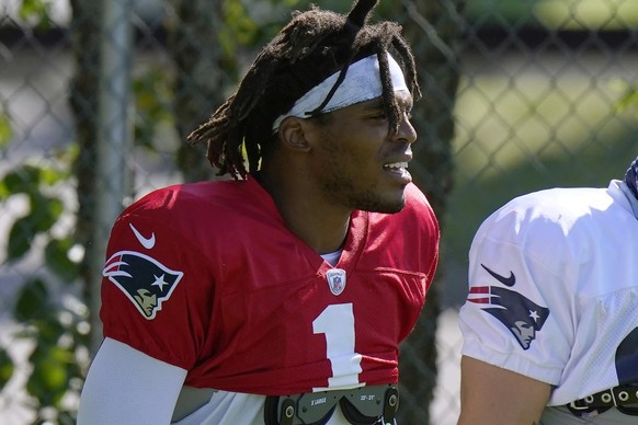 New England Patriots quarterback Cam Newton steps on the field at the start of an NFL football training camp practice, Tuesday, Aug. 18, 2020, in Foxborough, Mass. (AP Photo/Steven Senne, Pool)