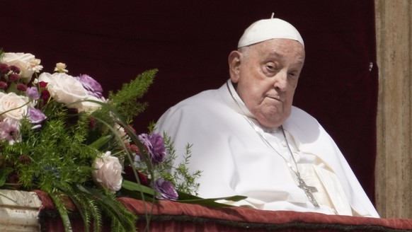 Pope Francis appears on the central lodge of St. Peter&#039;s Basilica to bestow the Urbi et Orbi (Latin for to the city and the world) blessing at the end of the Easter mass presided over by Cardinal ...
