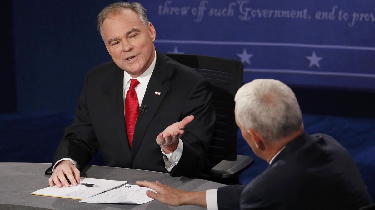 Democratic U.S. vice presidential nominee Senator Tim Kaine (L) and Republican U.S. vice presidential nominee Governor Mike Pence discuss an issue during their vice presidential debate at Longwood Uni ...