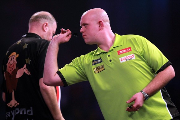 epa05694682 Michael van Gerwen during the PDC World Darts Championship semi final between Michael van Gerwen and Raymond van Barneveld at the Alexander Palace in London, Britain, 01 January 2017. EPA/ ...