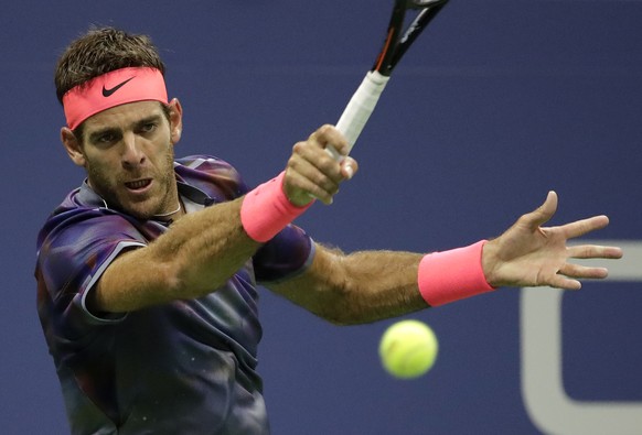 Juan Martin del Potro, of Argentina, hits a forehand to Roger Federer, of Switzerland, during the quarterfinals of the U.S. Open tennis tournament, Wednesday, Sept. 6, 2017, in New York. (AP Photo/Jul ...